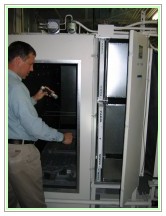 Francis "Frank" W. McGrail IV surveying an Air Filter Francis "Frank" W. McGrail IV surveying an Air Filter